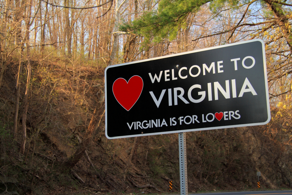a roadside sign welcomes travelers into virginia